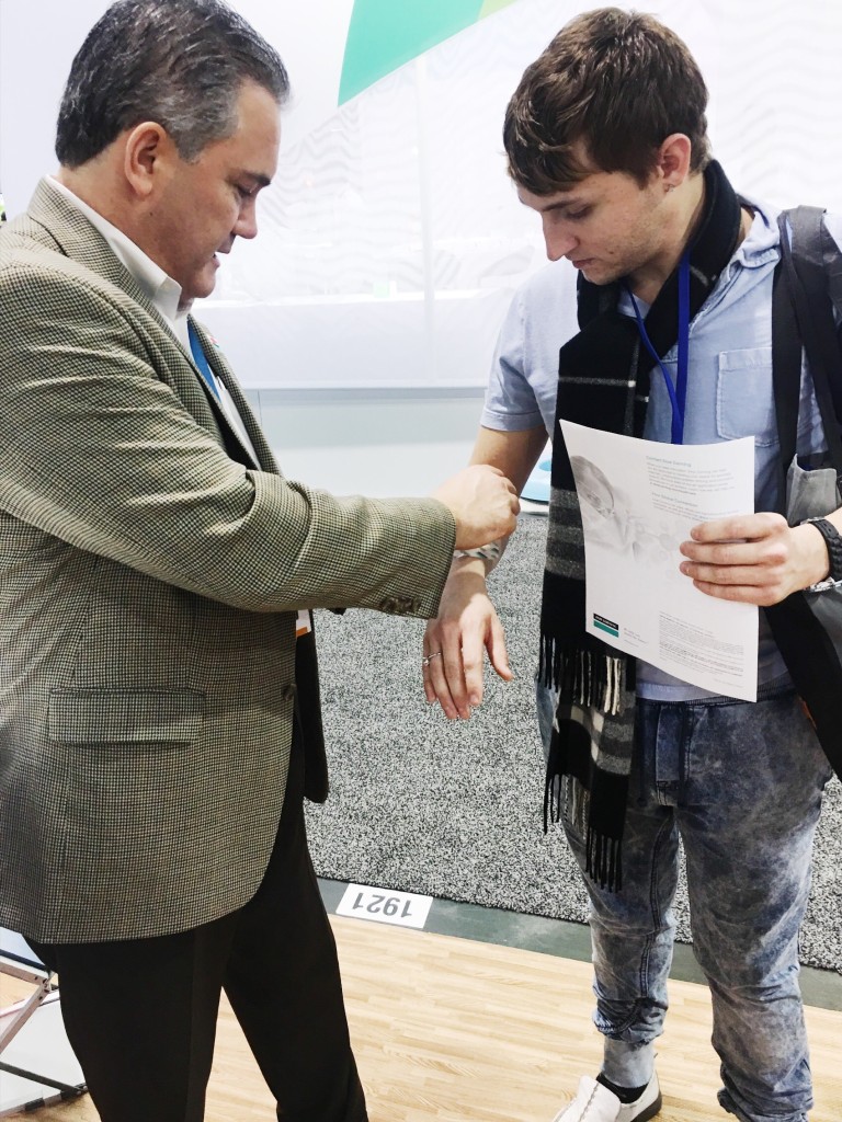 IBS Electronics Marketing Director, Matthew Amato, tests medical adhesive on his arm.